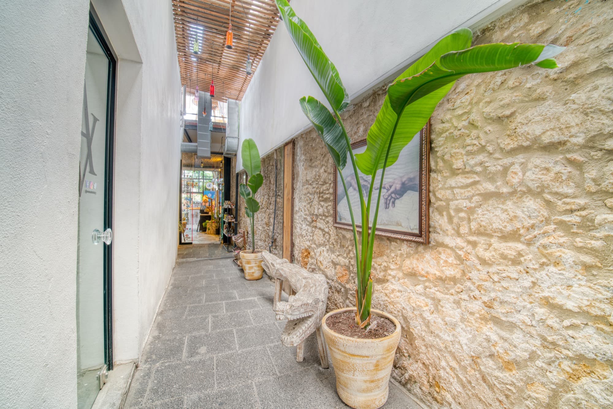 The stone-and-timber entrance of Avenue Hotel, Girne