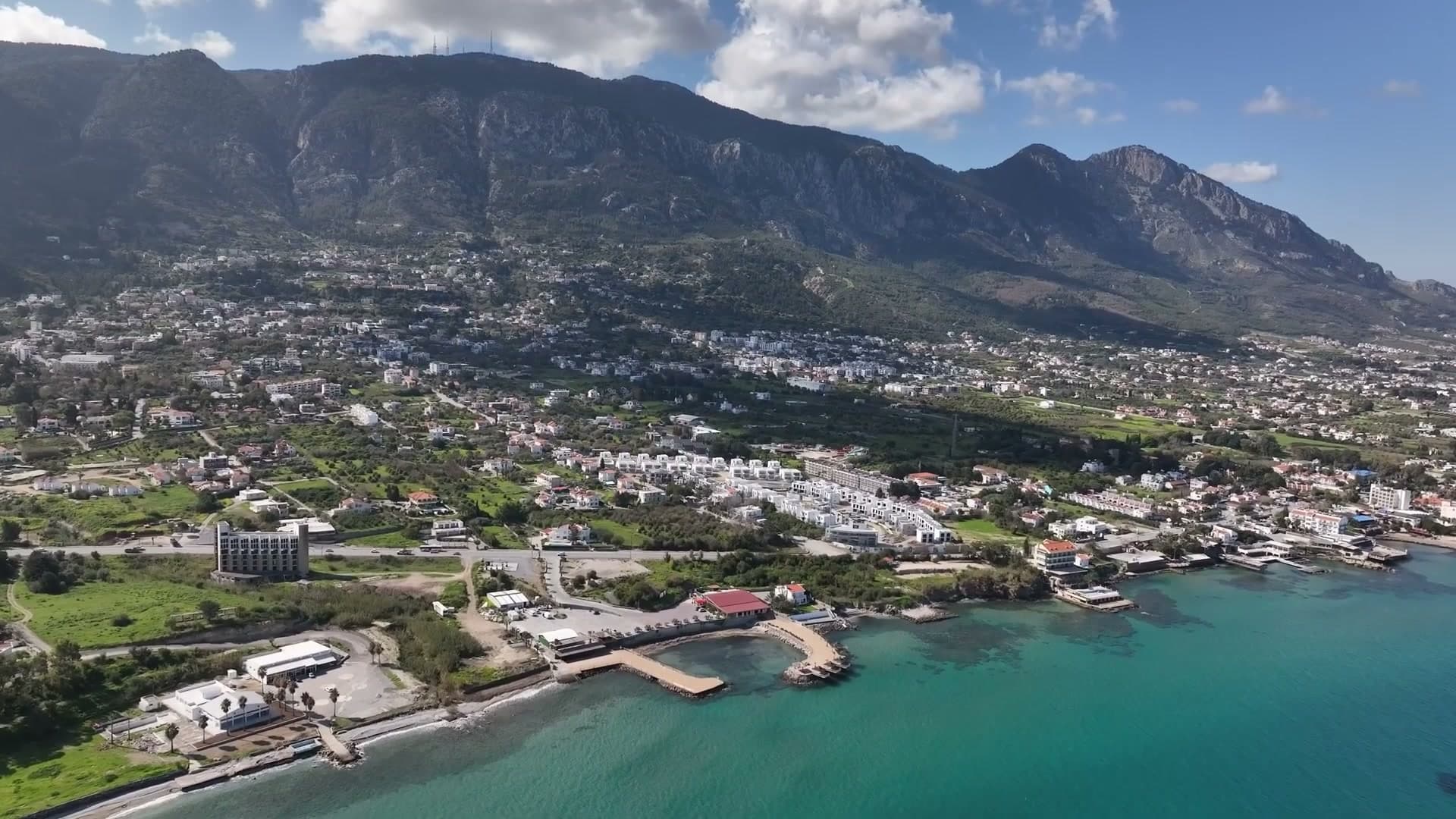 The Beşparmak mountains rising above Kyrenia (Girne) and the turquoise Mediterranean, North Cyprus